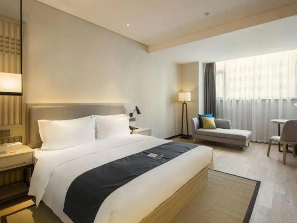 Bed in Echarm Hotel Changsha Gaoqiao