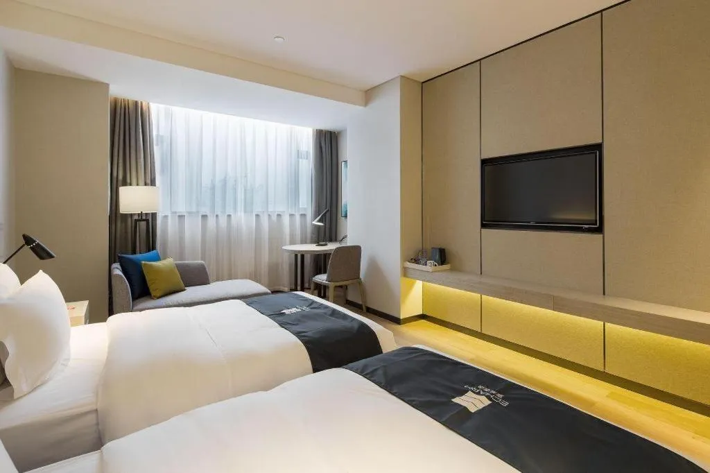 Bed in Echarm Hotel Changsha Gaoqiao