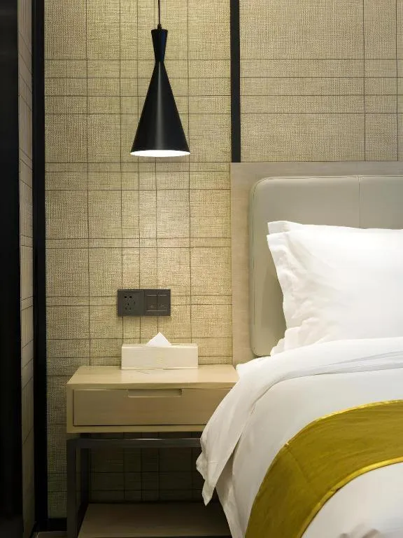 Bed in Echarm Hotel Changsha Gaoqiao