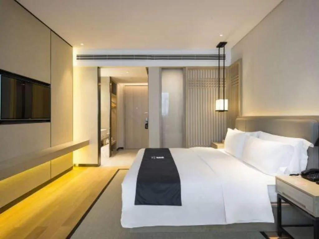 Bed in Echarm Hotel Changsha Gaoqiao