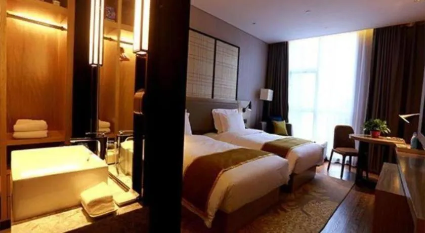 Bed in Echarm Hotel Changsha Gaoqiao