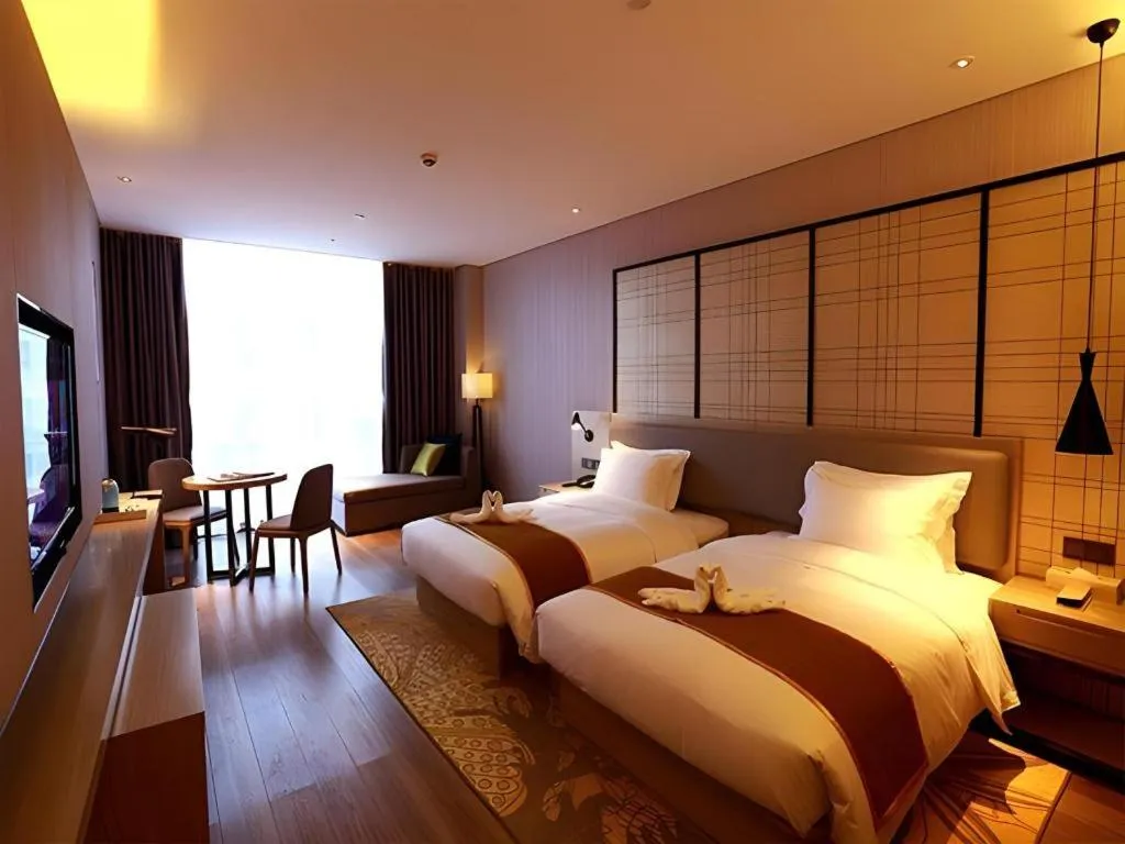 Bed in Echarm Hotel Changsha Gaoqiao