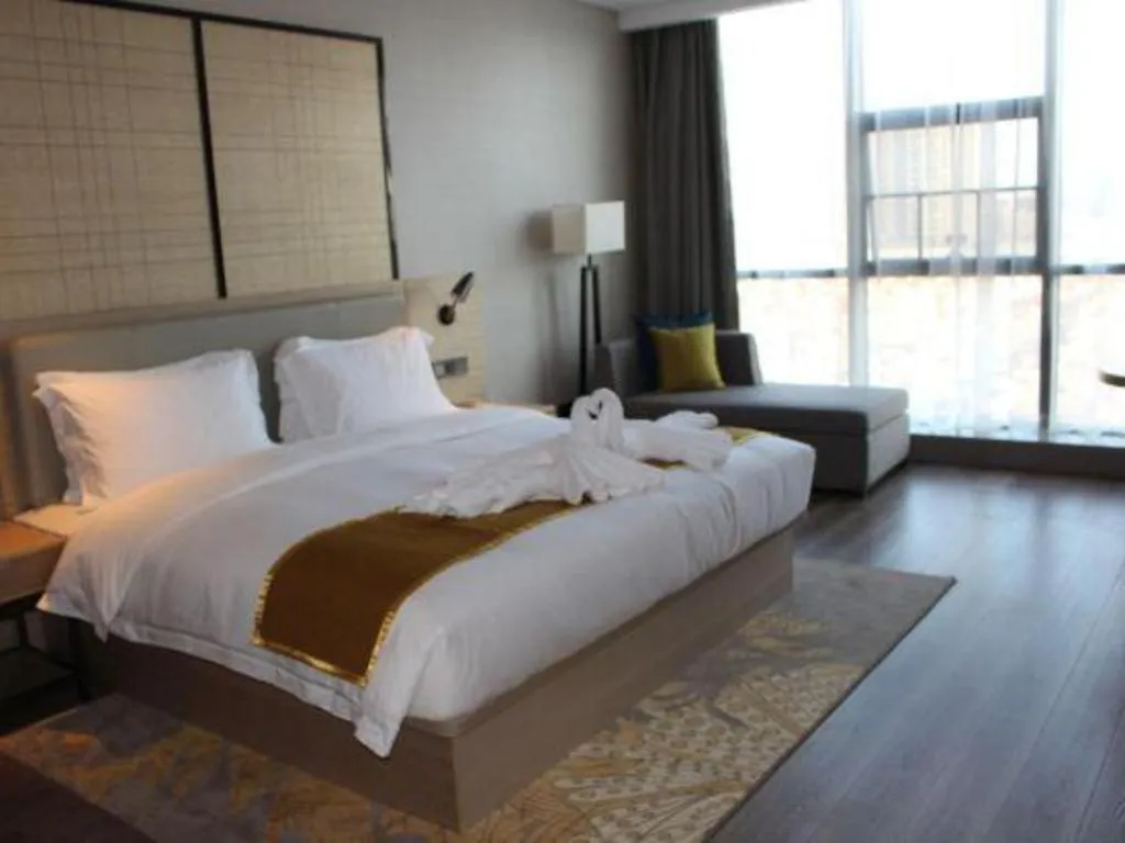 Bed in Echarm Hotel Changsha Gaoqiao