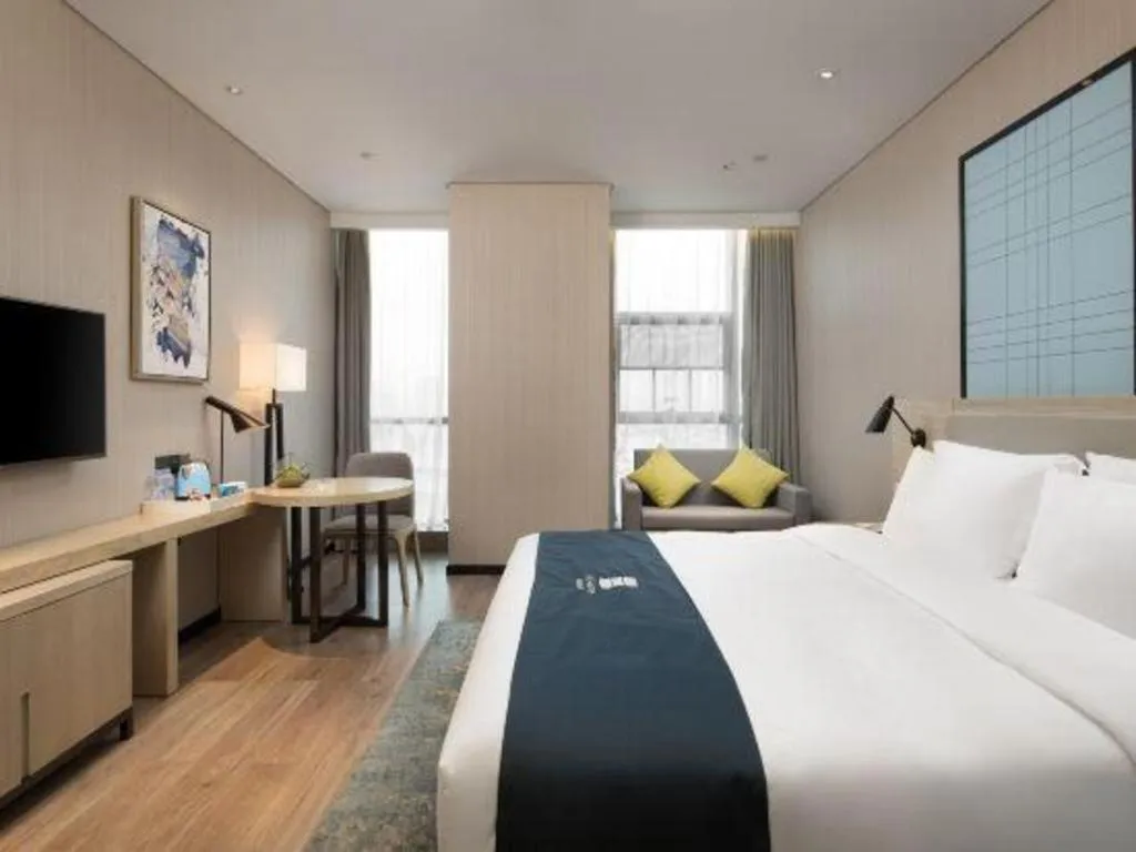 Bed in Echarm Hotel Changsha Gaoqiao