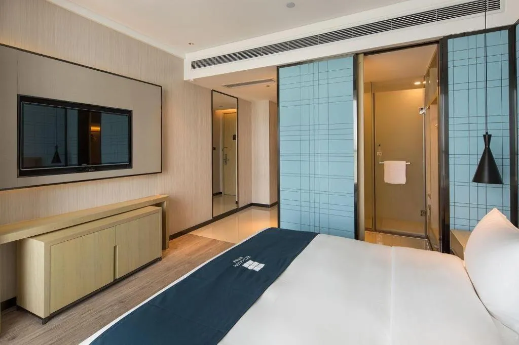 Bed in Echarm Hotel Changsha Gaoqiao