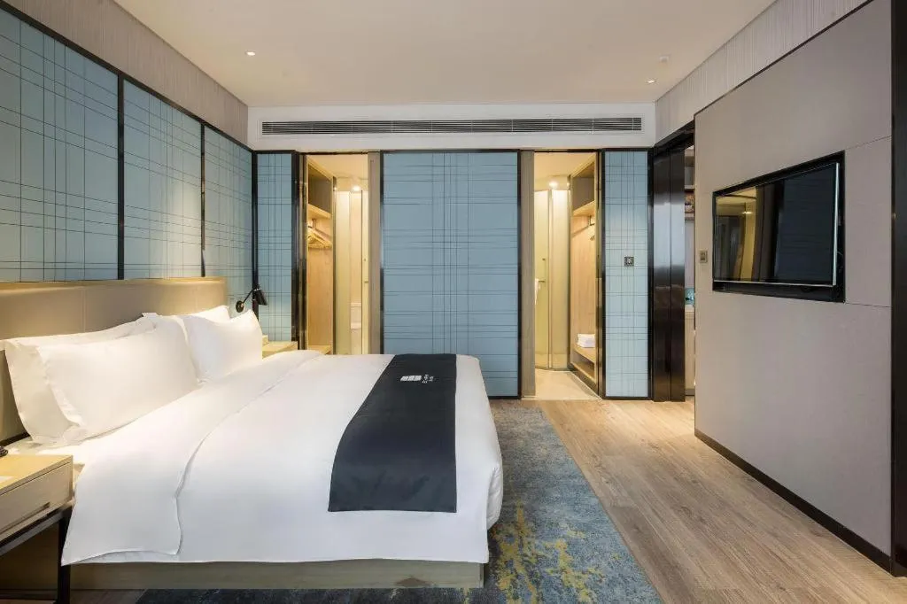 Bed in Echarm Hotel Changsha Gaoqiao