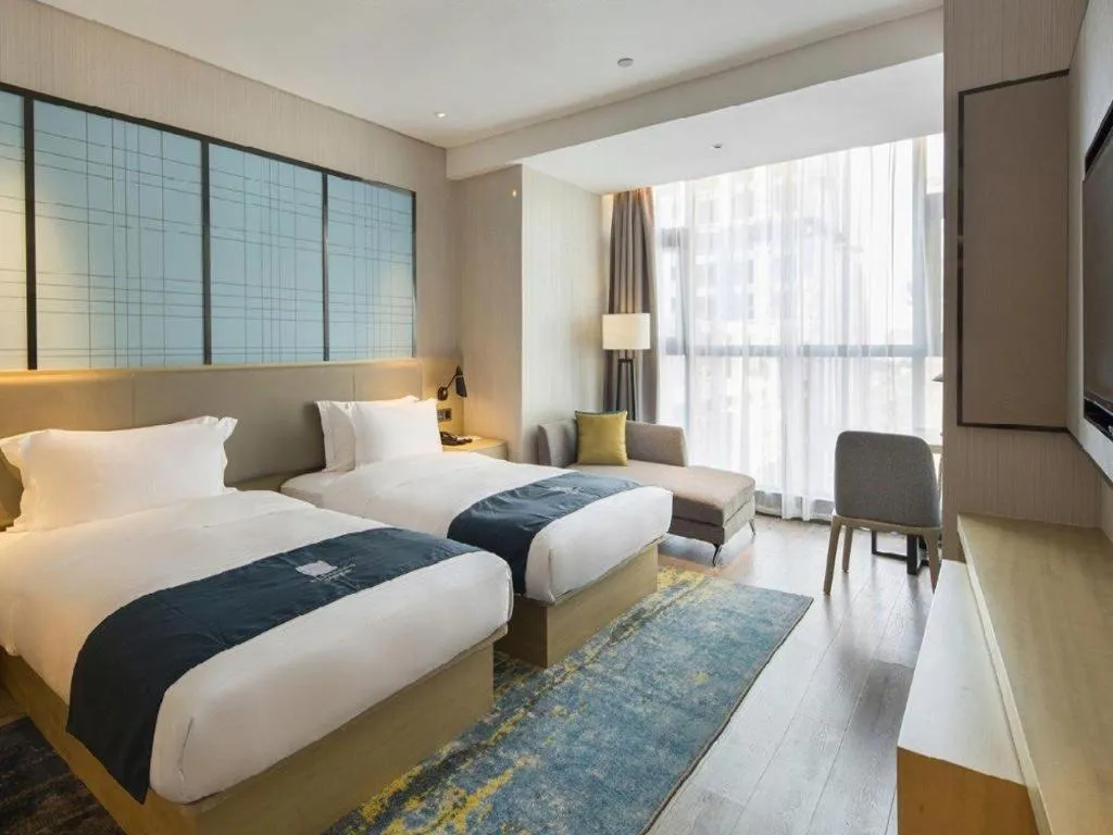 Bed in Echarm Hotel Changsha Gaoqiao