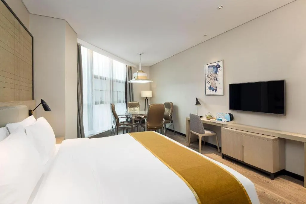 Bed in Echarm Hotel Changsha Gaoqiao