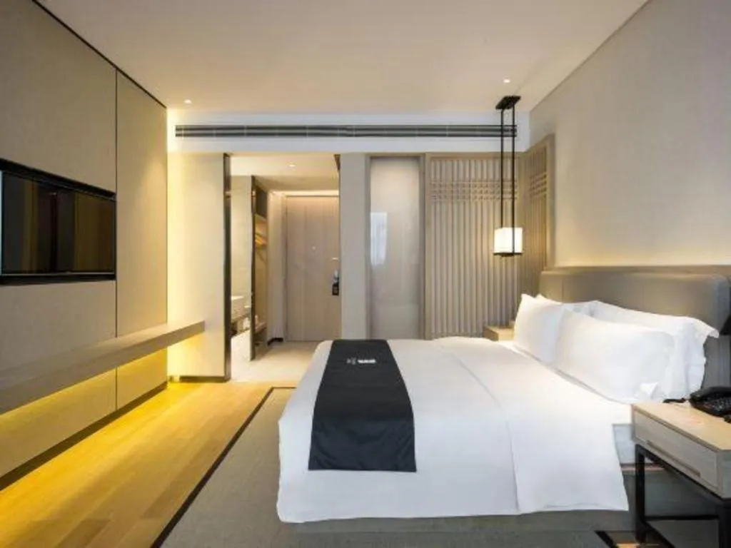 Bed in Echarm Hotel Changsha Gaoqiao