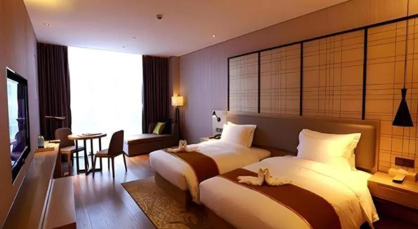 Bed in Echarm Hotel Changsha Gaoqiao