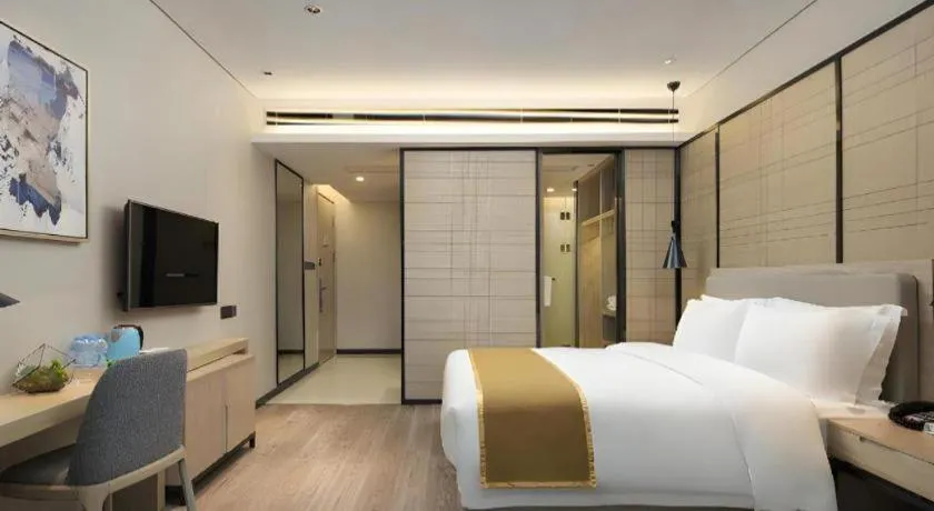 Bed in Echarm Hotel Changsha Gaoqiao