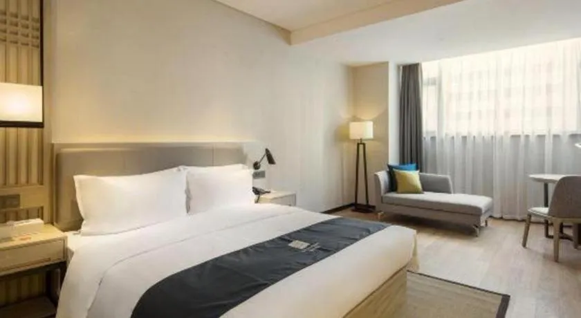 Bed in Echarm Hotel Changsha Gaoqiao