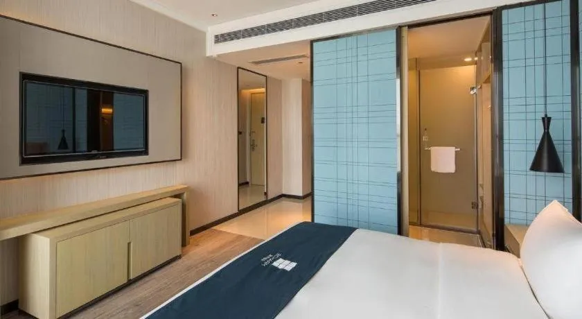 Bed in Echarm Hotel Changsha Gaoqiao