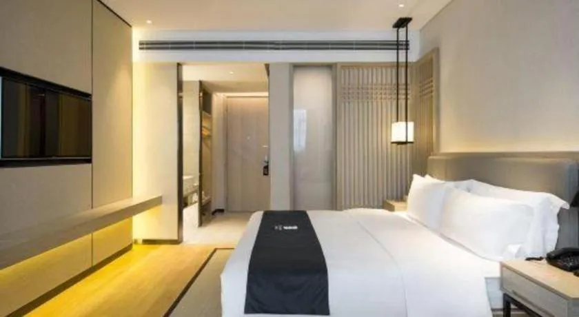 Bed in Echarm Hotel Changsha Gaoqiao