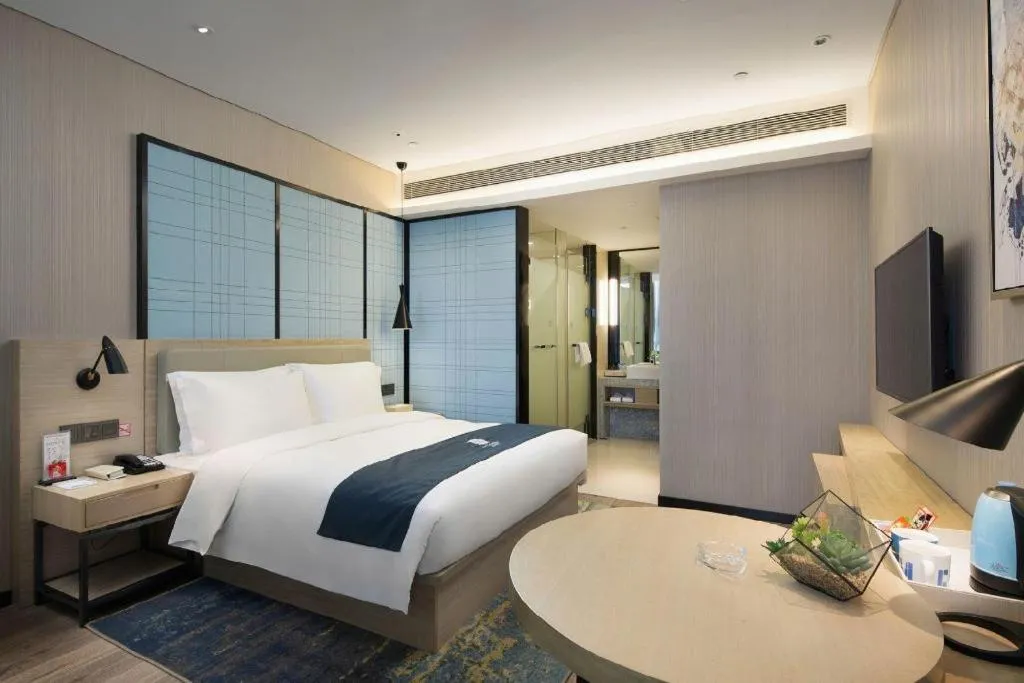 Bed in Echarm Hotel Changsha Gaoqiao