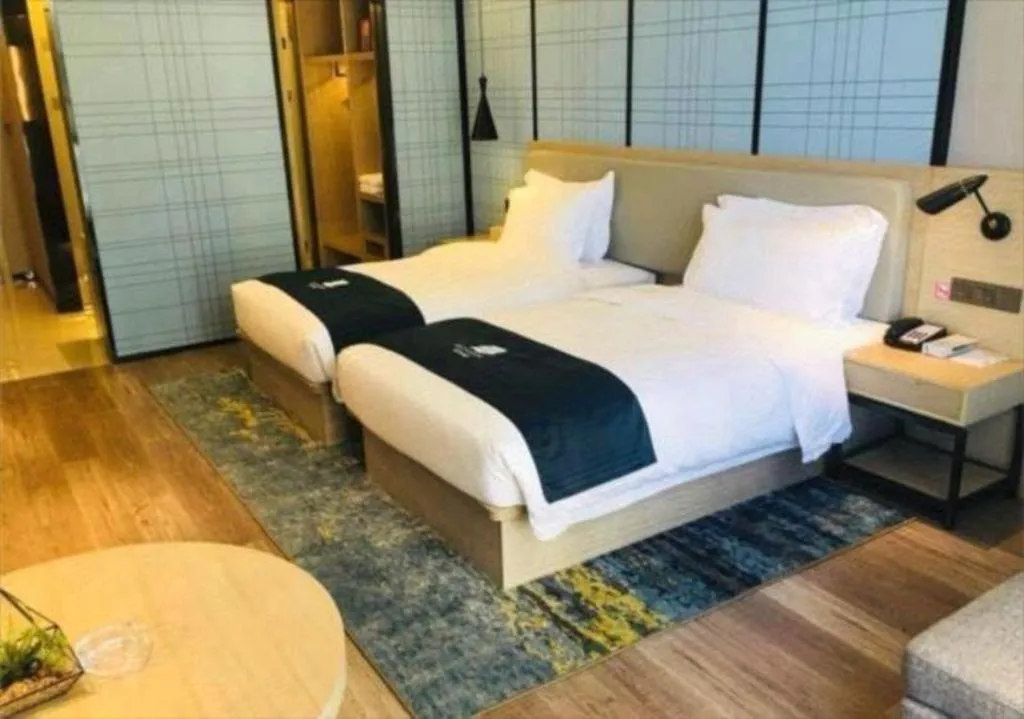 Bed in Echarm Hotel Changsha Gaoqiao