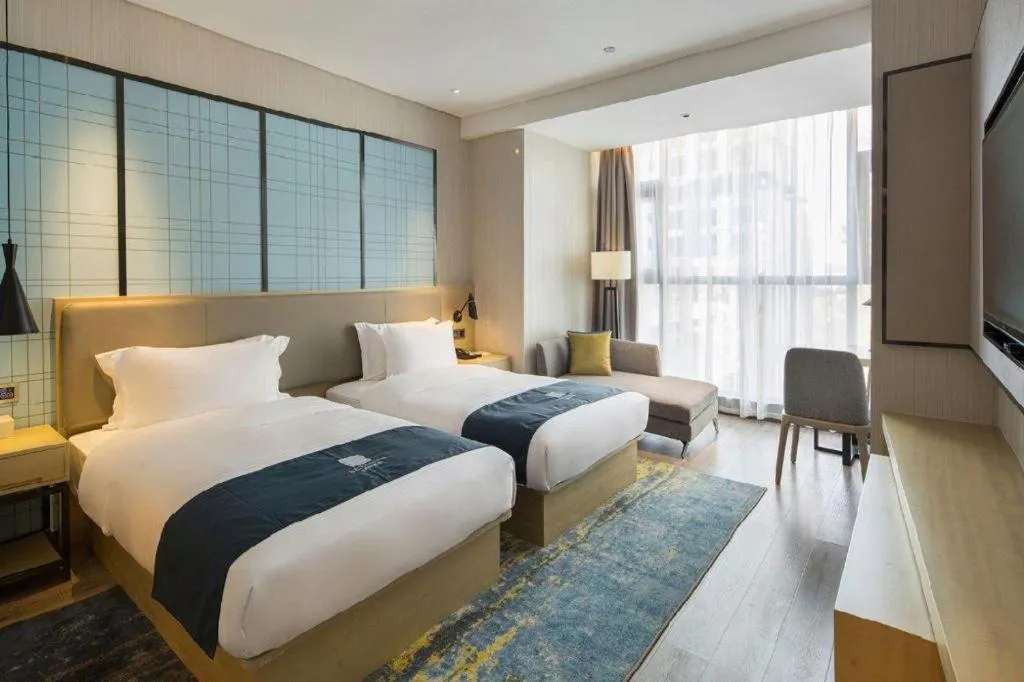 Bed in Echarm Hotel Changsha Gaoqiao