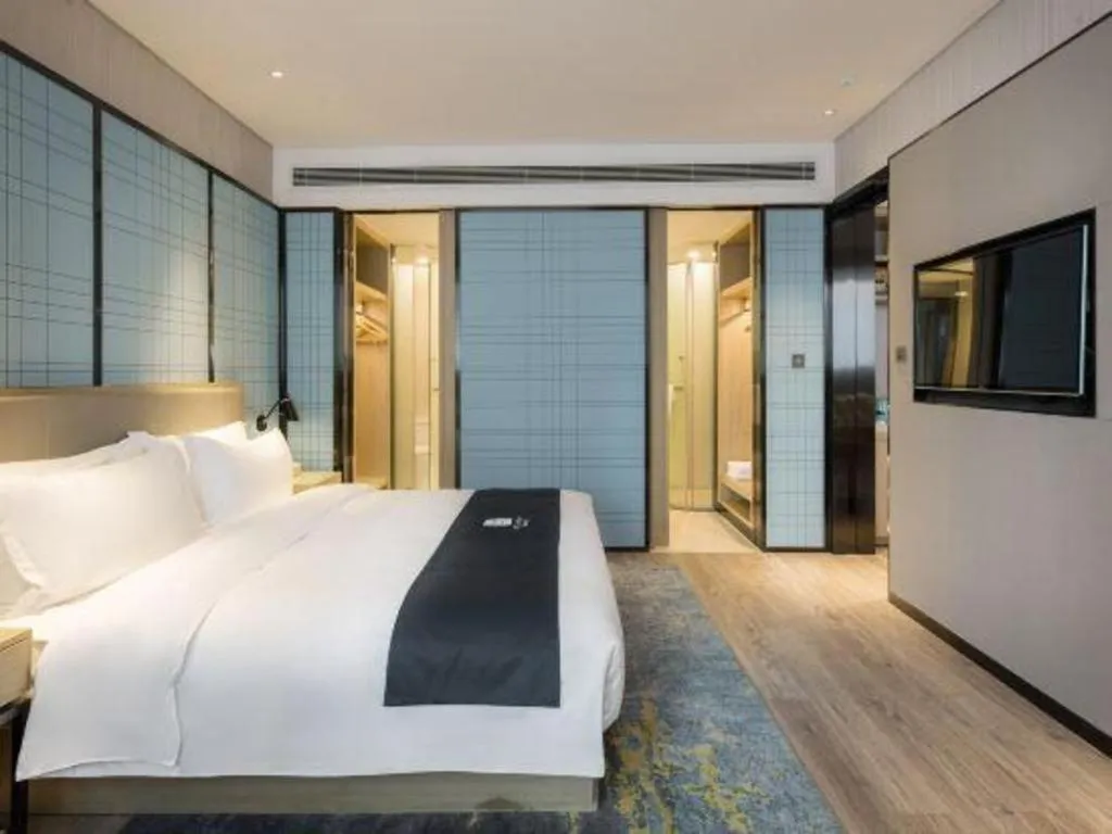 Bed in Echarm Hotel Changsha Gaoqiao