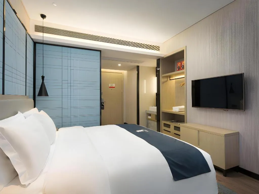 Bed in Echarm Hotel Changsha Gaoqiao