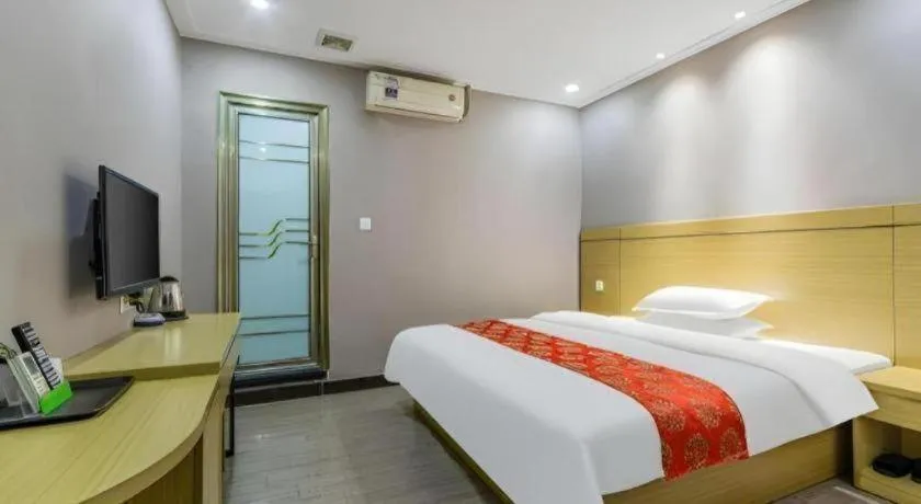 Bed in Ying Feng Yuan Hotel