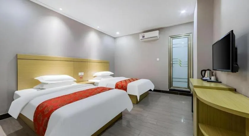 Bed in Ying Feng Yuan Hotel