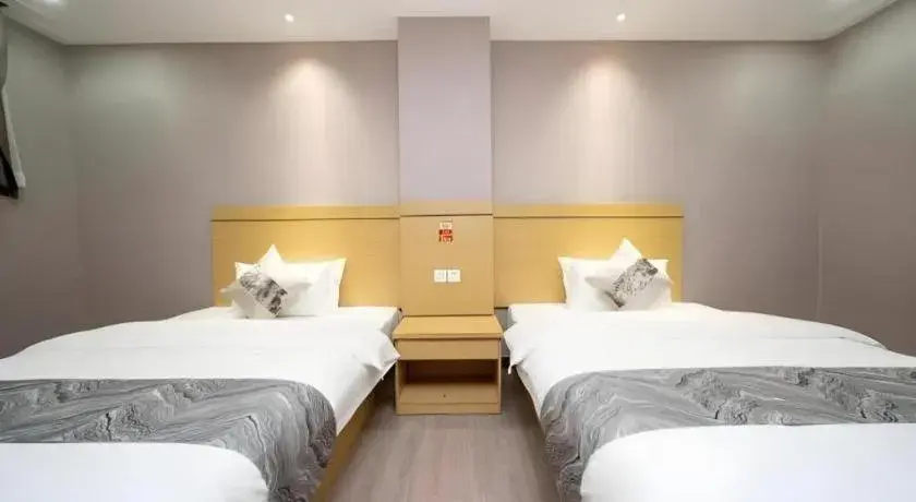 Bed in Ying Feng Yuan Hotel Bed in Ying Feng Yuan Hotel