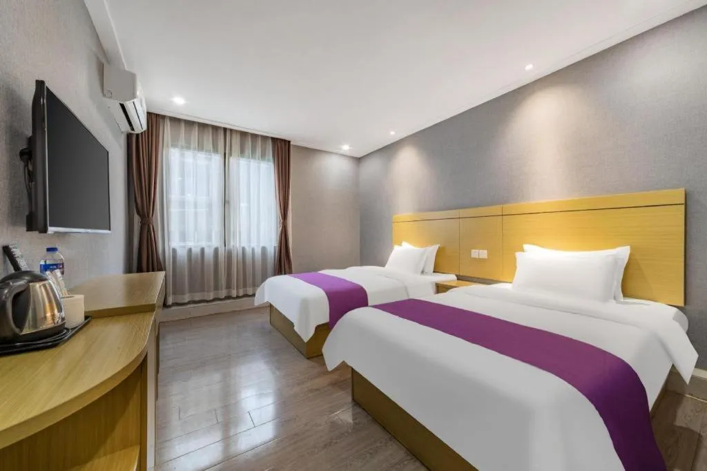 Bed in Ying Feng Yuan Hotel