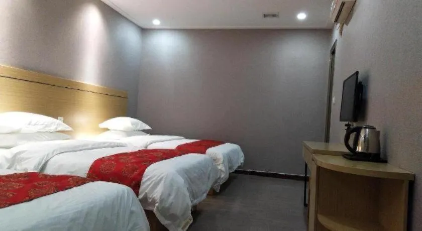 Bed in Ying Feng Yuan Hotel