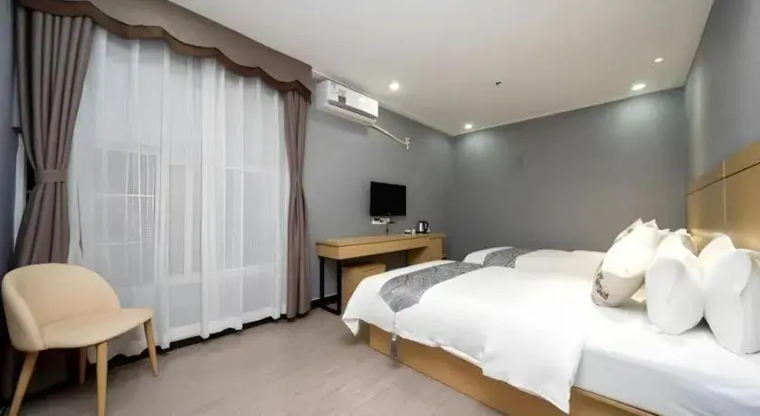 Bed in Ying Feng Yuan Hotel Bed in Ying Feng Yuan Hotel