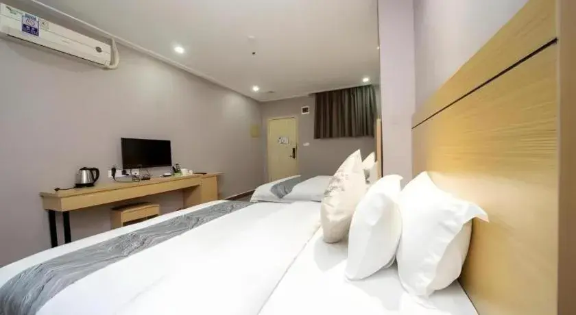 Bed in Ying Feng Yuan Hotel Bed in Ying Feng Yuan Hotel