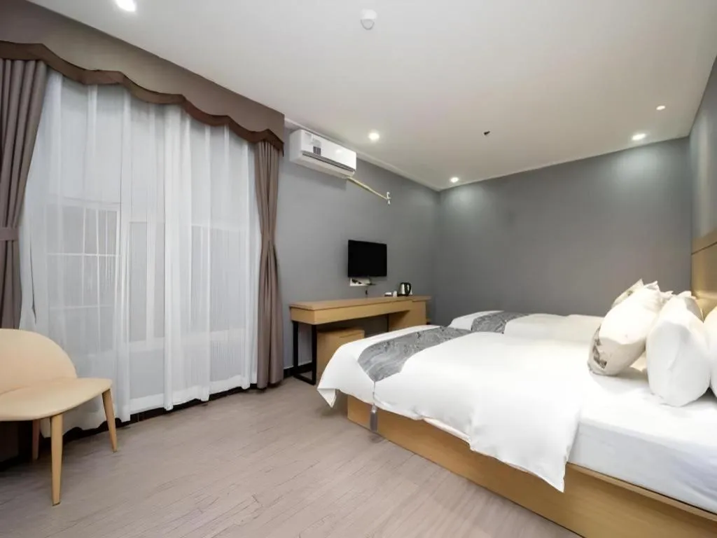 Bed in Ying Feng Yuan Hotel