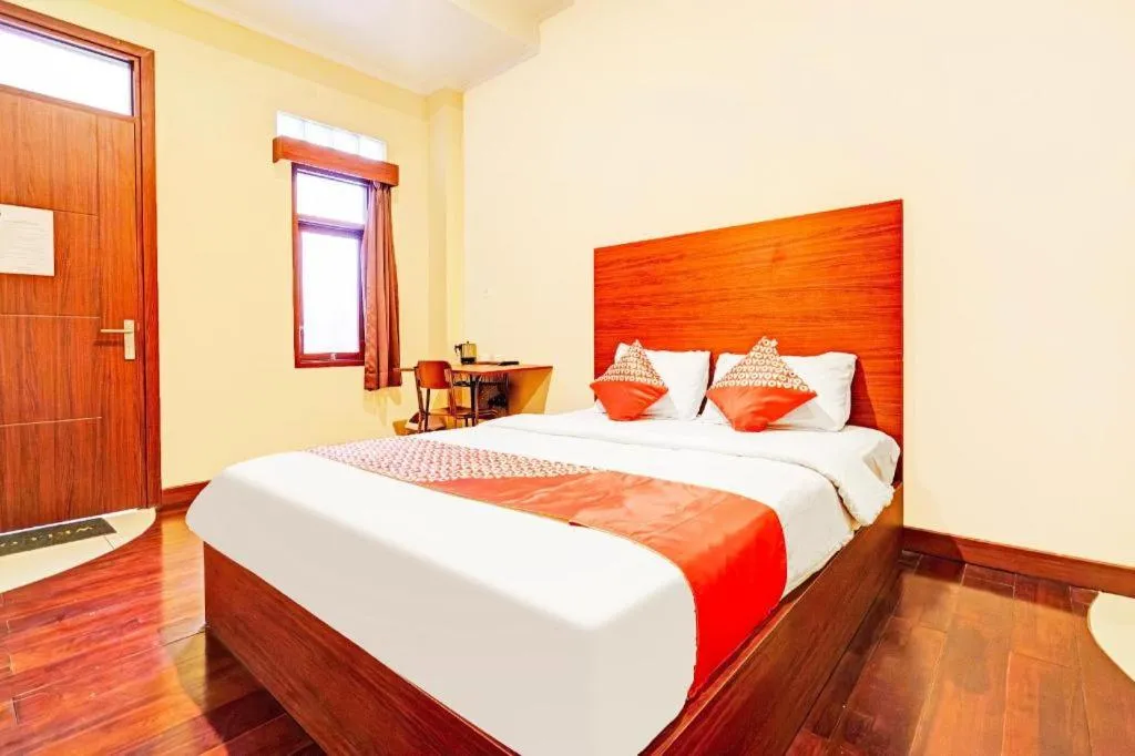 Bed in OYO Maleo Exclusive Residence near Universitas Kristen Maranatha