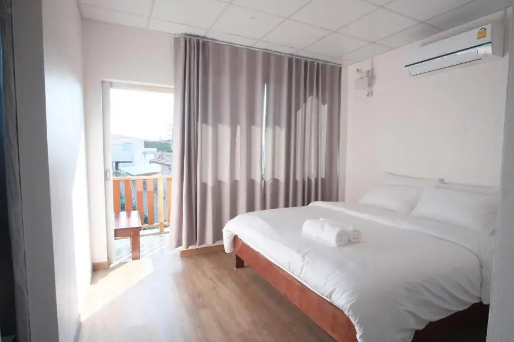 Bed in Thaitara Chiangkhan Bed in Thaitara Chiangkhan