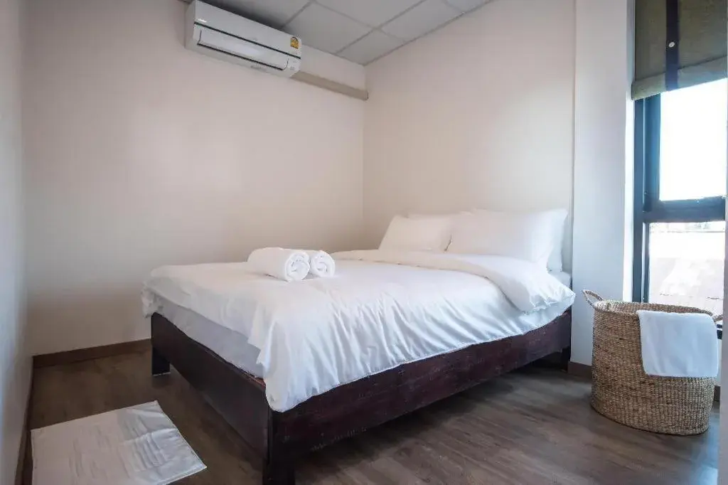 Bed in Thaitara Chiangkhan Bed in Thaitara Chiangkhan