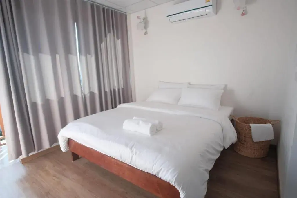 Bed in Thaitara Chiangkhan Bed in Thaitara Chiangkhan