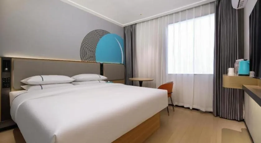 Bed in City Comfort Inn Guilin Xiangbi Mountain Park