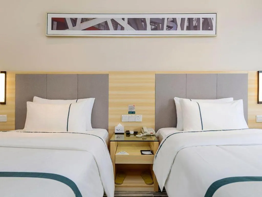 Bed in City Comfort Inn Guiyang Yan'an Middle Road Fountain Metro Station