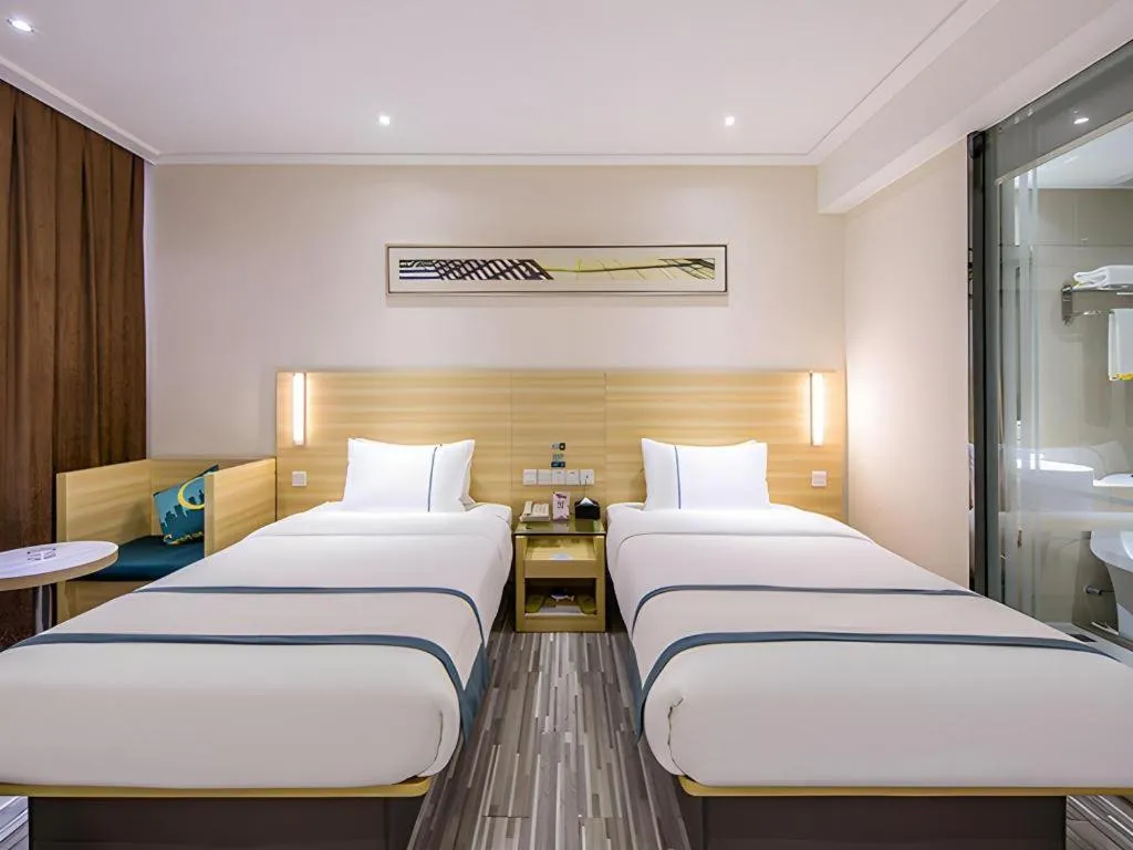 Bed in City Comfort Inn Guiyang Yan'an Middle Road Fountain Metro Station