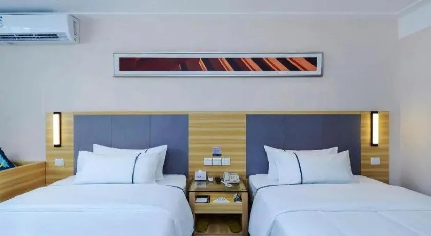 Bed in City Comfort Inn Guiyang Yan'an Middle Road Fountain Metro Station