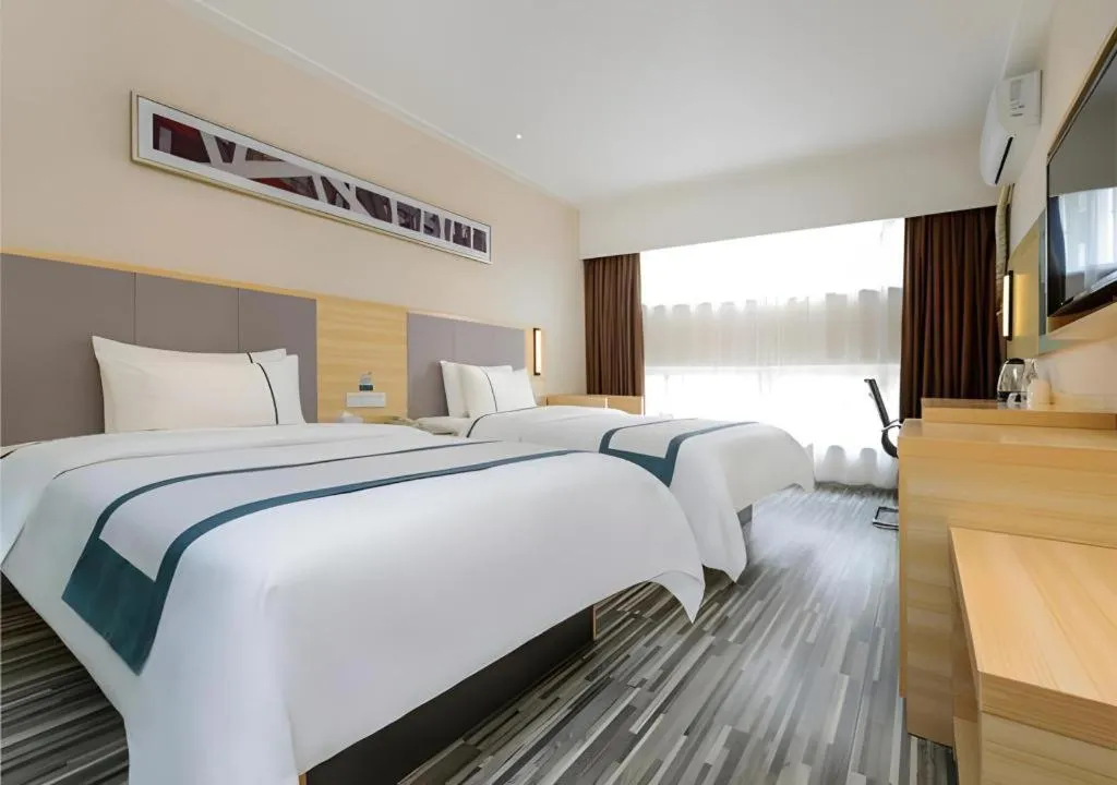 Bed in City Comfort Inn Guiyang Yan'an Middle Road Fountain Metro Station