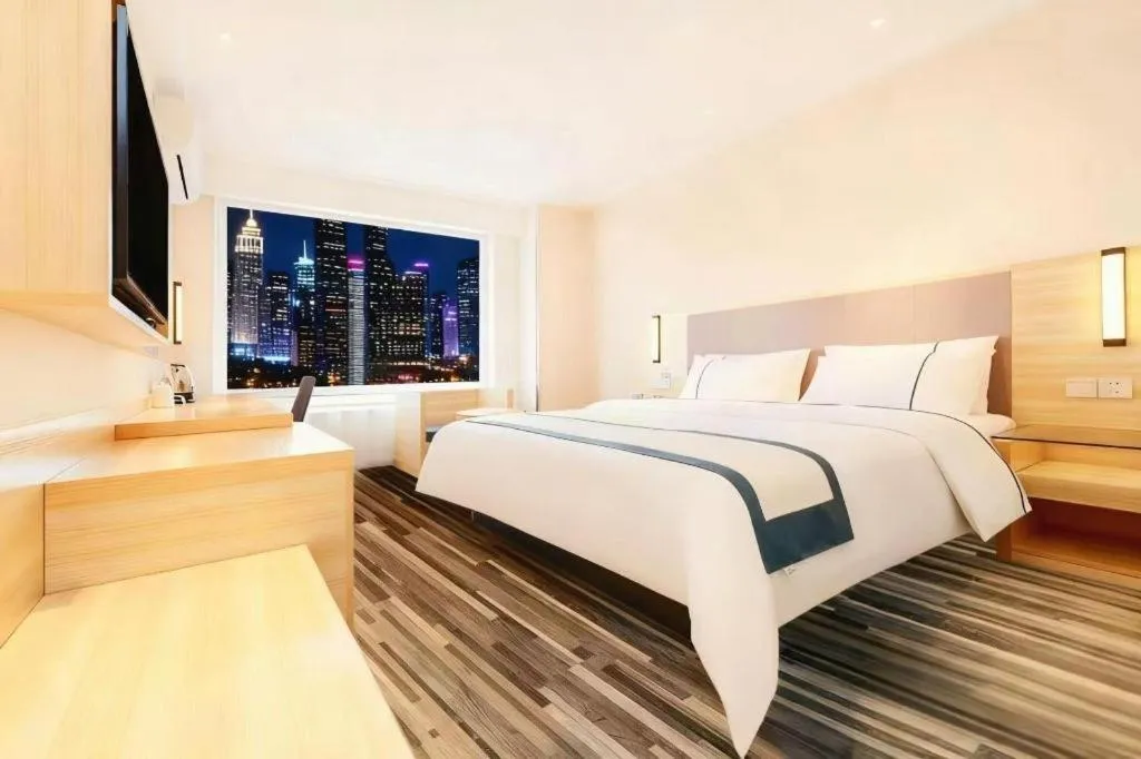 Bed in City Comfort Inn Guiyang Yan'an Middle Road Fountain Metro Station