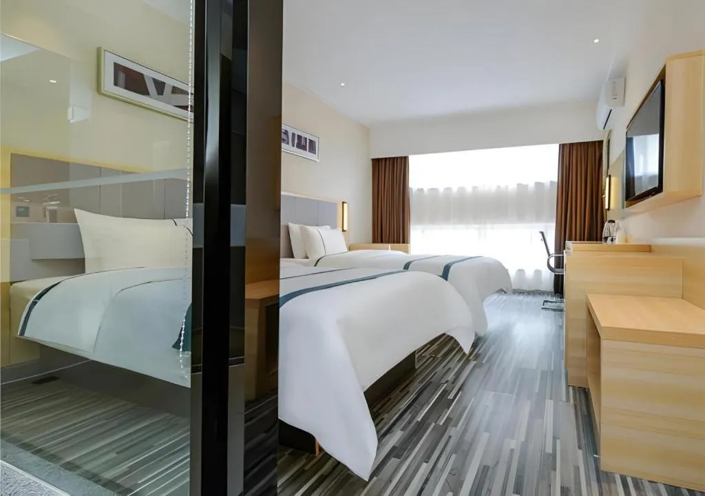 Bed in City Comfort Inn Guiyang Yan'an Middle Road Fountain Metro Station