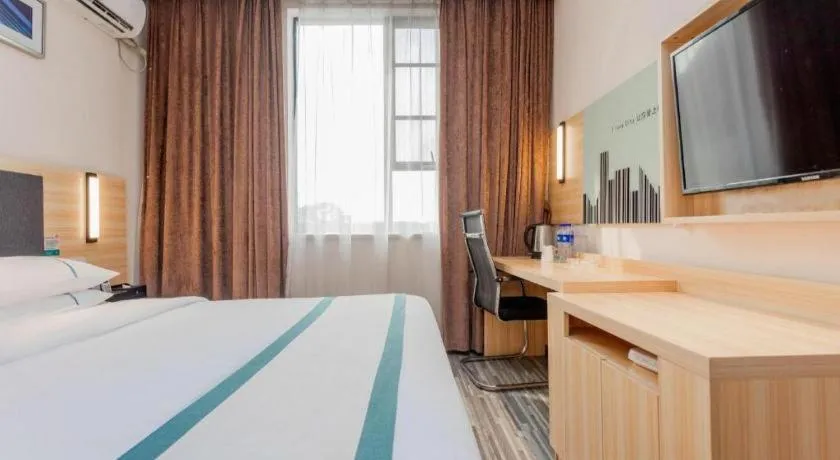 Bed in City Comfort Inn Liuzhou High-speed Railway Station Entrance