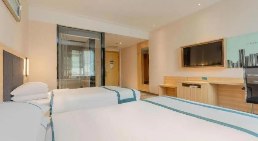 Bed in City Comfort Inn Liuzhou High-speed Railway Station Entrance