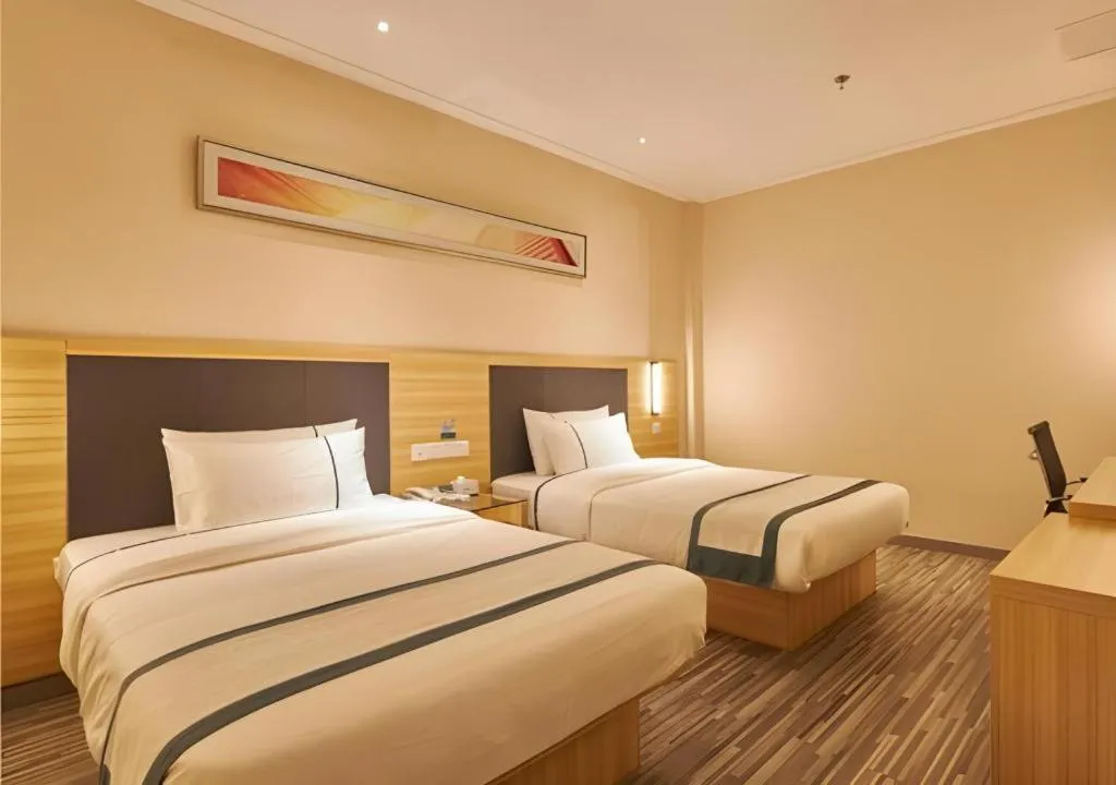 Bed in City Comfort Inn Liuzhou High-speed Railway Station Entrance