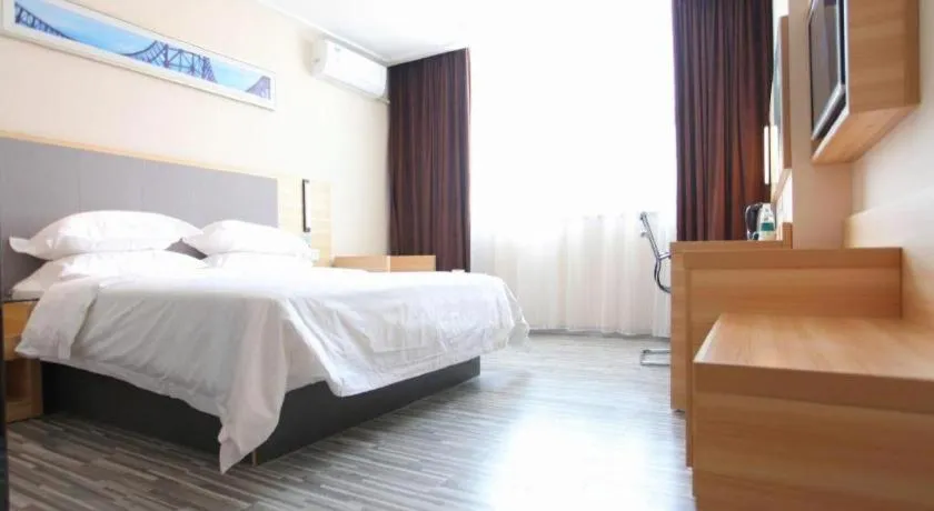 Bed in City Comfort Inn Fangcheng Qunxing Avenue