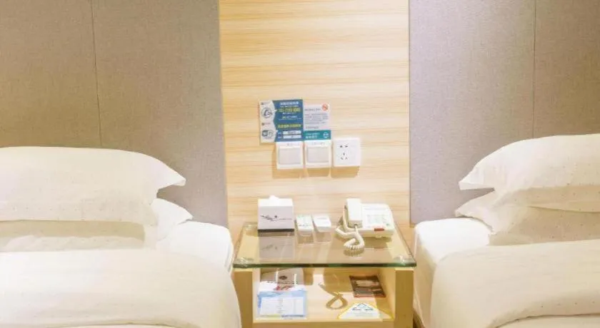 Bed in City Comfort Inn Fangcheng Qunxing Avenue