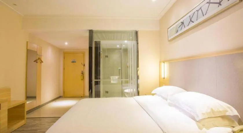 Bed in City Comfort Inn Fangcheng Qunxing Avenue