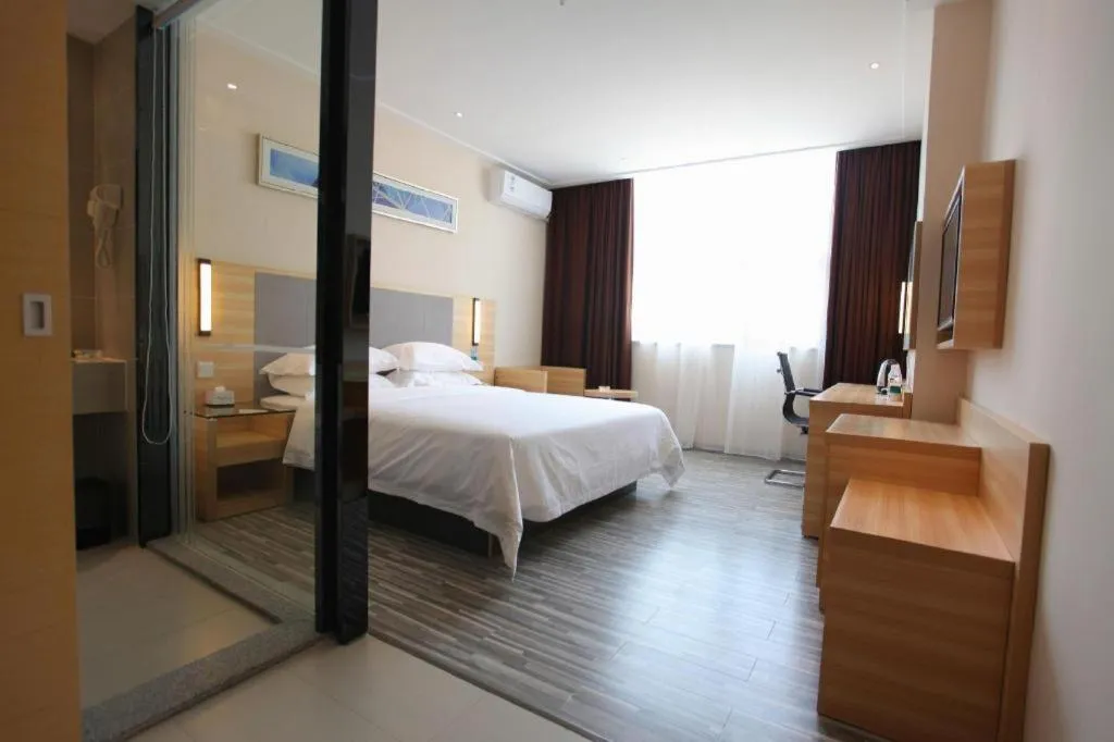 Bed in City Comfort Inn Fangcheng Qunxing Avenue