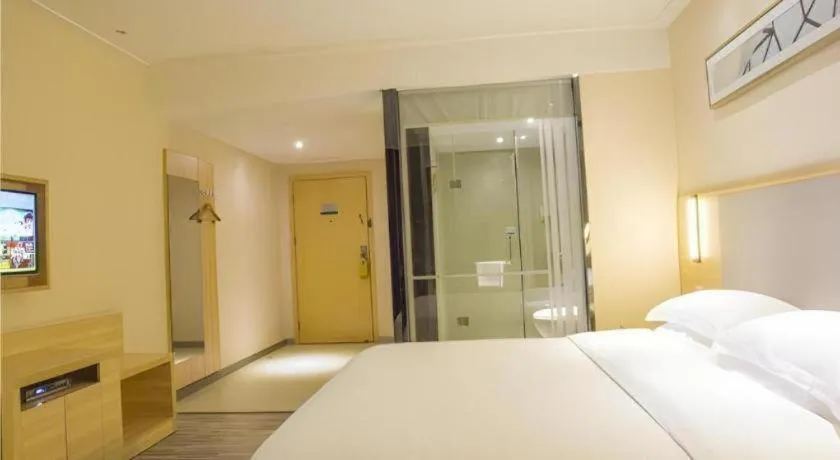 Bed in City Comfort Inn Fangcheng Qunxing Avenue